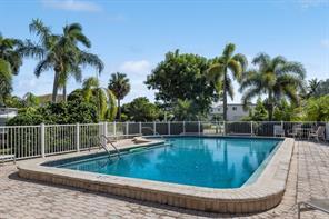 2734 Northeast 27th Court, Unit 21 Lighthouse Point, FL 33064 - Photo 8 of 8 Maria Community Pool