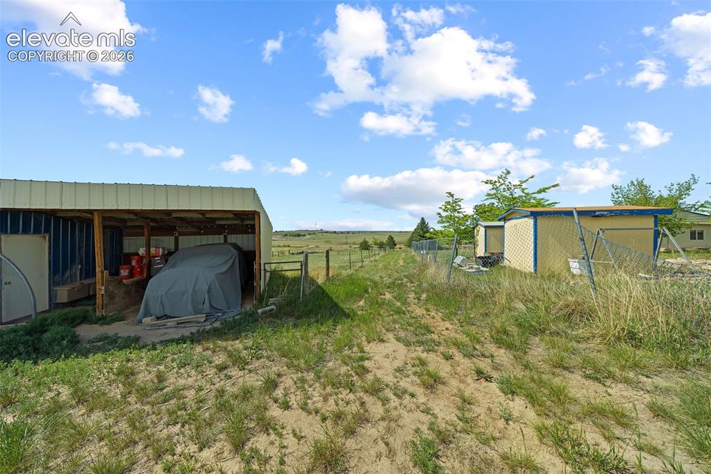 13075 Blaney Road South Peyton, CO 80831 - Photo 33 of 40 Horse stalls and tack room