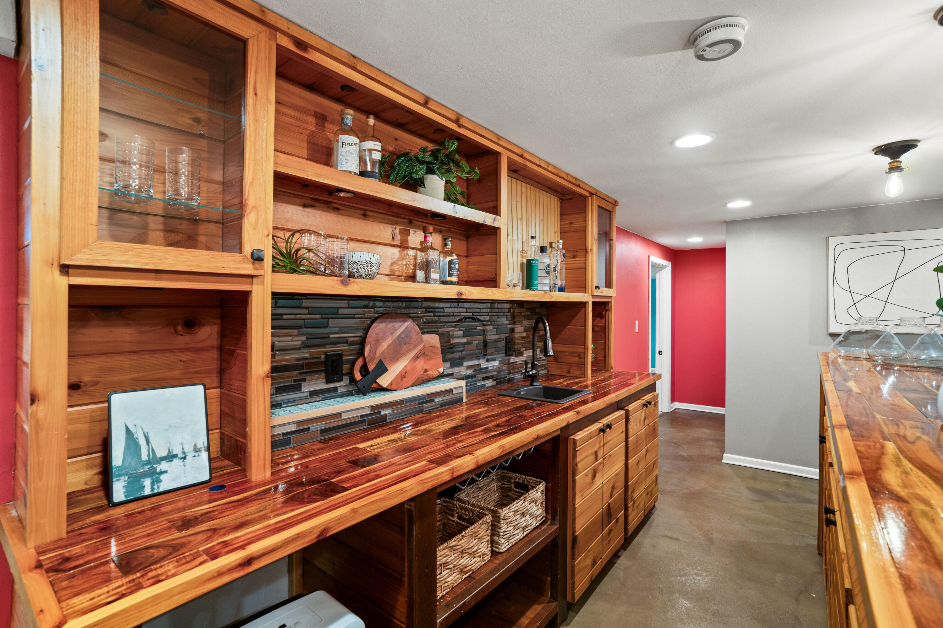 8930 North Maitland Road Bayside, WI 53217 - Photo 34 of 47 This custom made wet bar was created with repurposed wood from an old sauna.