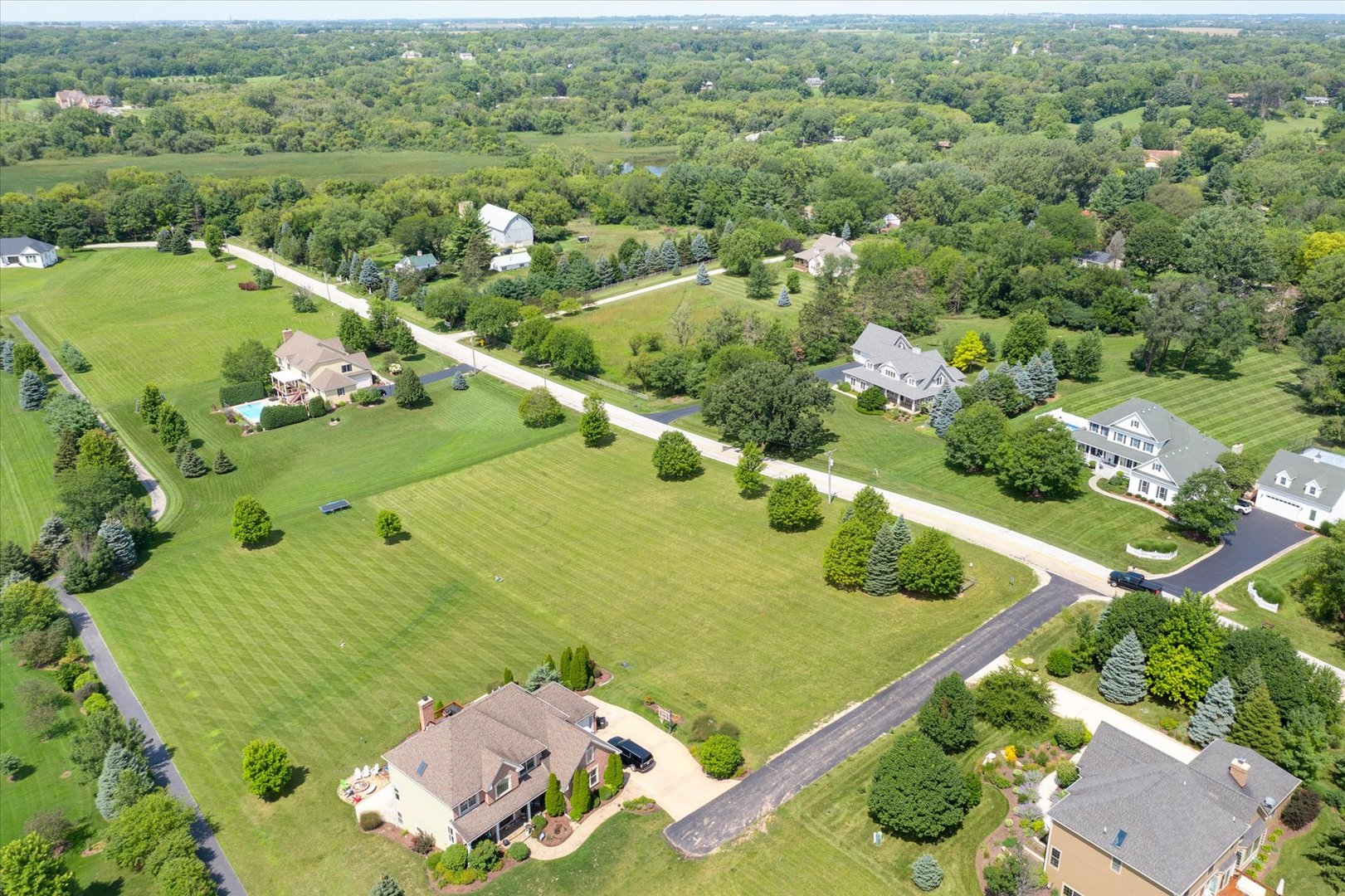 41-w099 Brown Road St. Charles, IL 60175 - Photo 3 of 10 an aerial view of a residential houses with outdoor space and street view