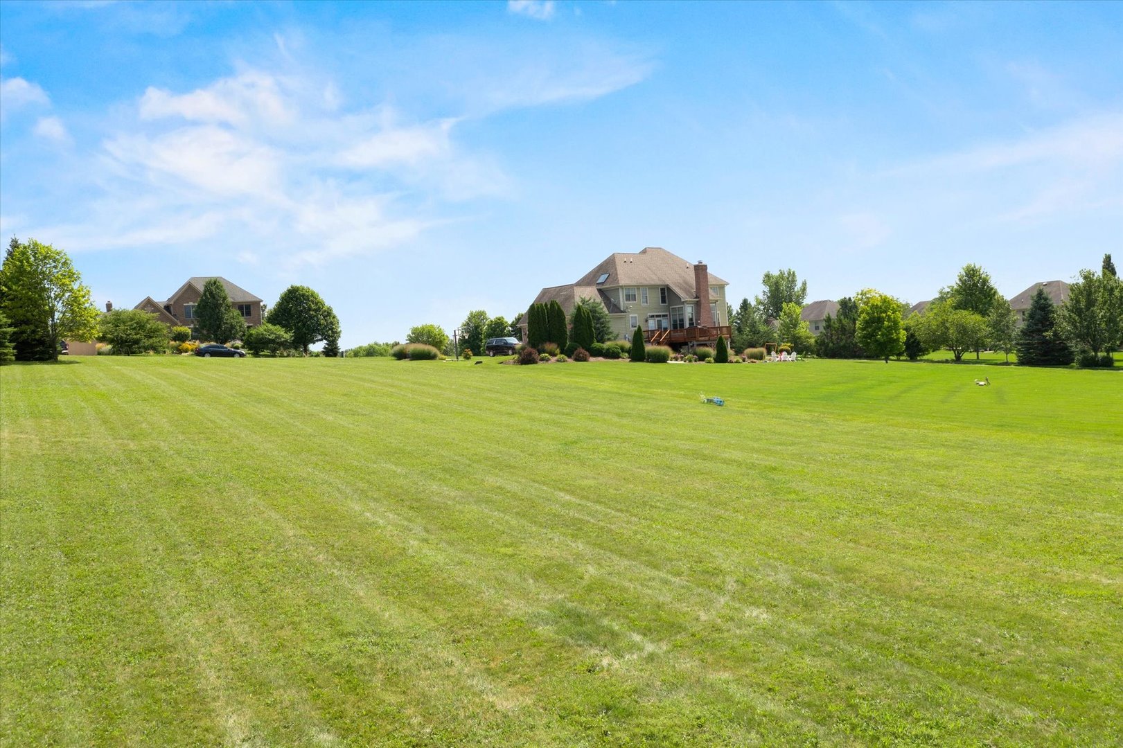 41-w099 Brown Road St. Charles, IL 60175 - Photo 8 of 10 a view of a field with an ocean