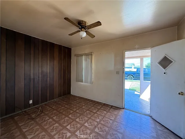 a view of an empty room and window