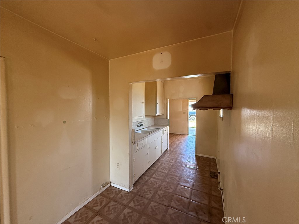 2035 North Grandee Avenue Compton, CA 90222 - Photo 8 of 21 a bathroom with a sink and mirror