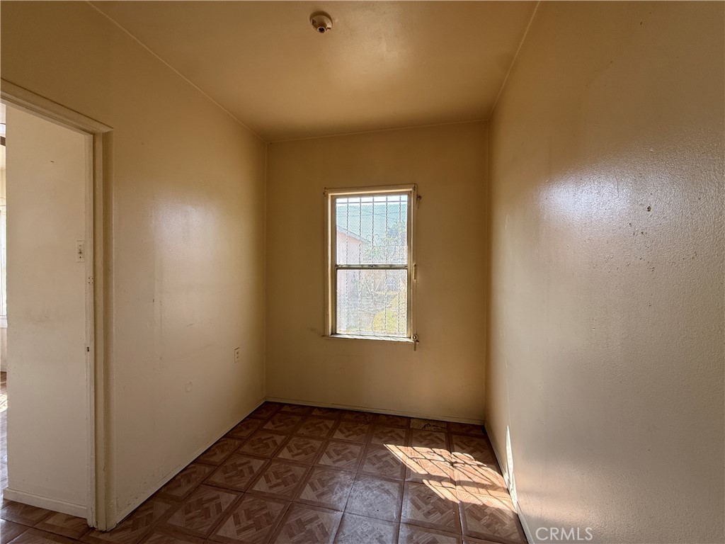 2035 North Grandee Avenue Compton, CA 90222 - Photo 9 of 21 an empty room with windows