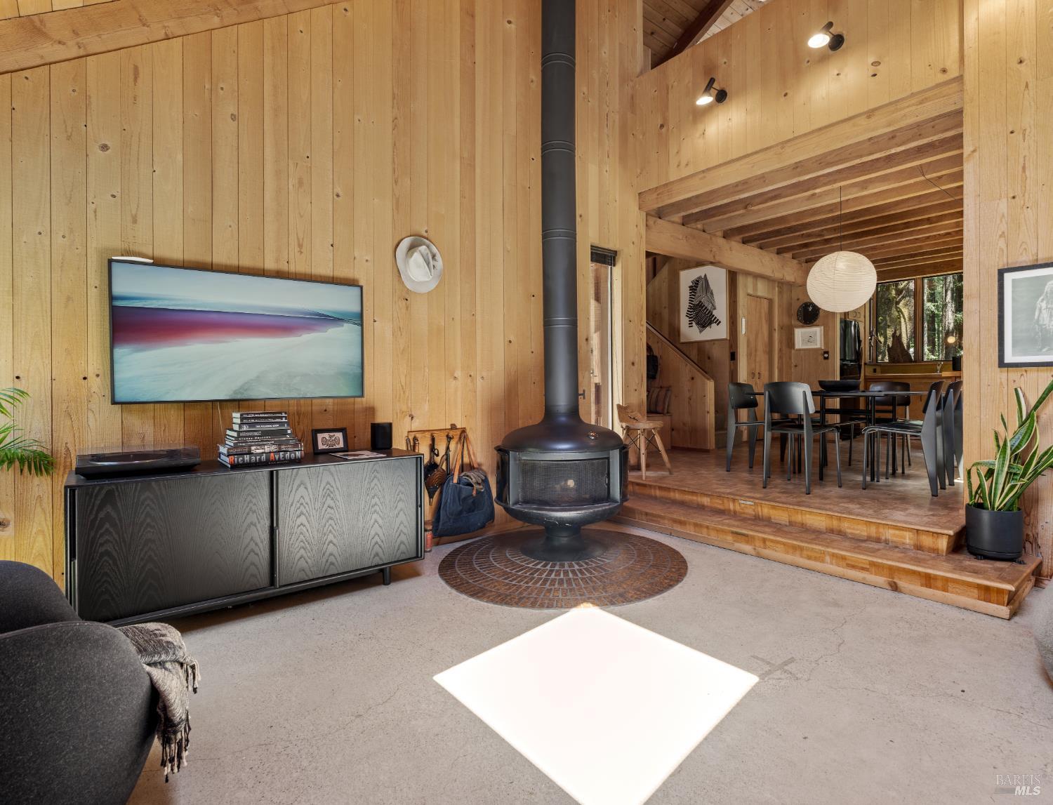 36778 Timber Ridge Road The Sea Ranch, CA 95497 - Photo 19 of 44 a living room with furniture and a flat screen tv