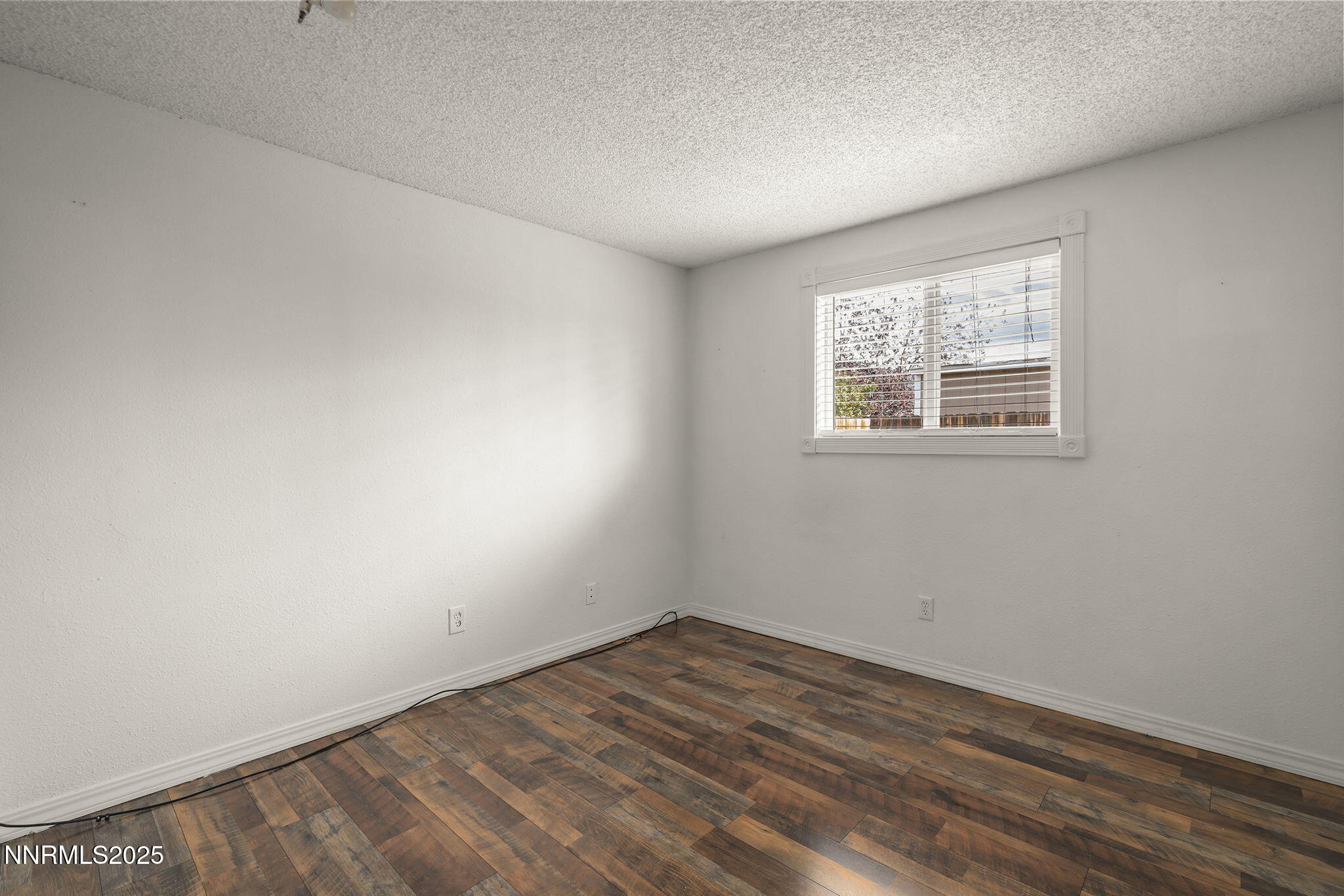 10005 Sagewood Drive Reno, NV 89506 - Photo 21 of 43 an empty room with a window