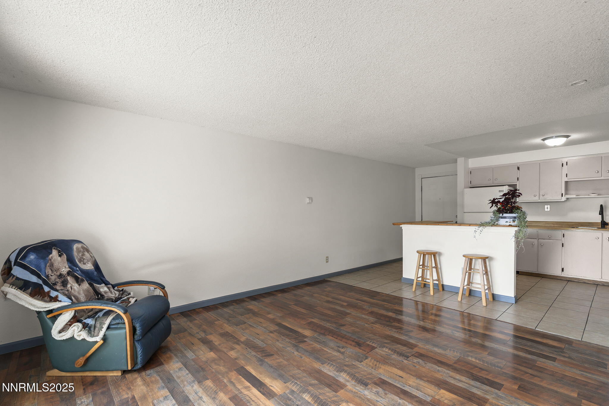 10005 Sagewood Drive Reno, NV 89506 - Photo 26 of 43 a view of a workspace with wooden floor