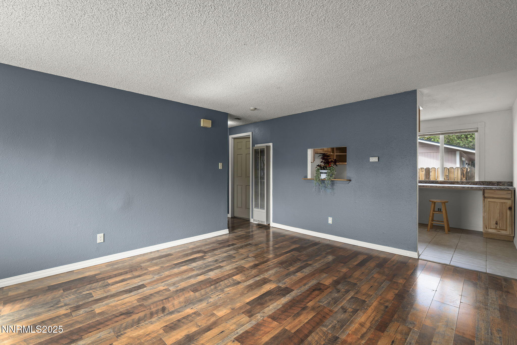 10005 Sagewood Drive Reno, NV 89506 - Photo 7 of 43 a view of a livingroom with wooden floor