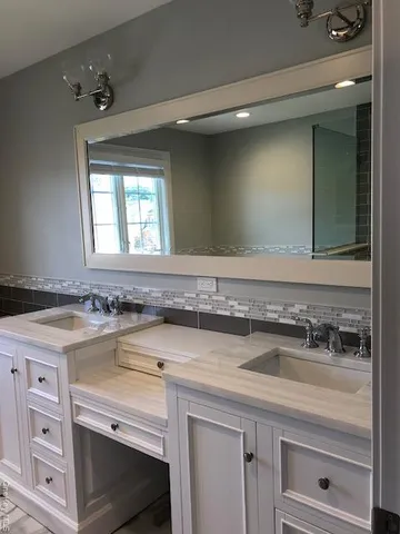 a view of kitchen with cabinets and wooden floor