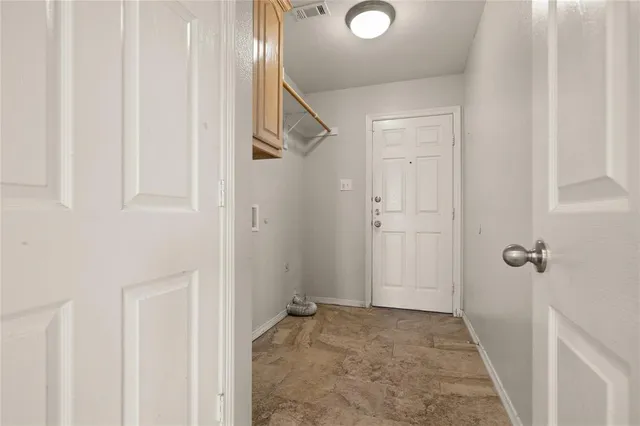 a view of a hallway with a elevator