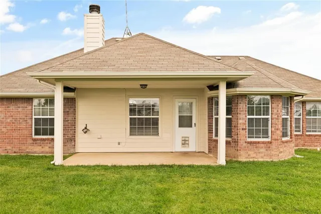 a house view with a garden space