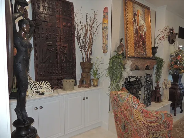 a bathroom with a granite countertop sink a mirror and shower