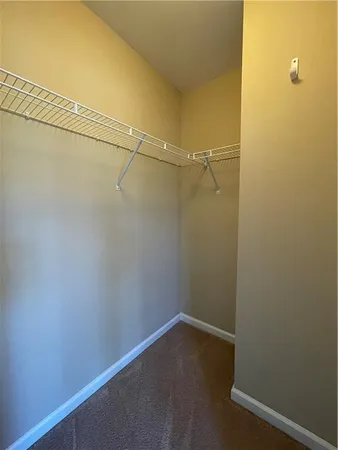 a view of a room with racks on the wall