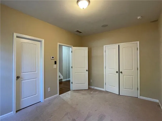 wooden floor and closet in a room