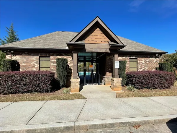 a front view of a house with a garage