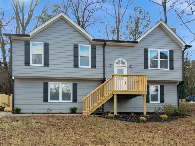 a front view of a house with a porch