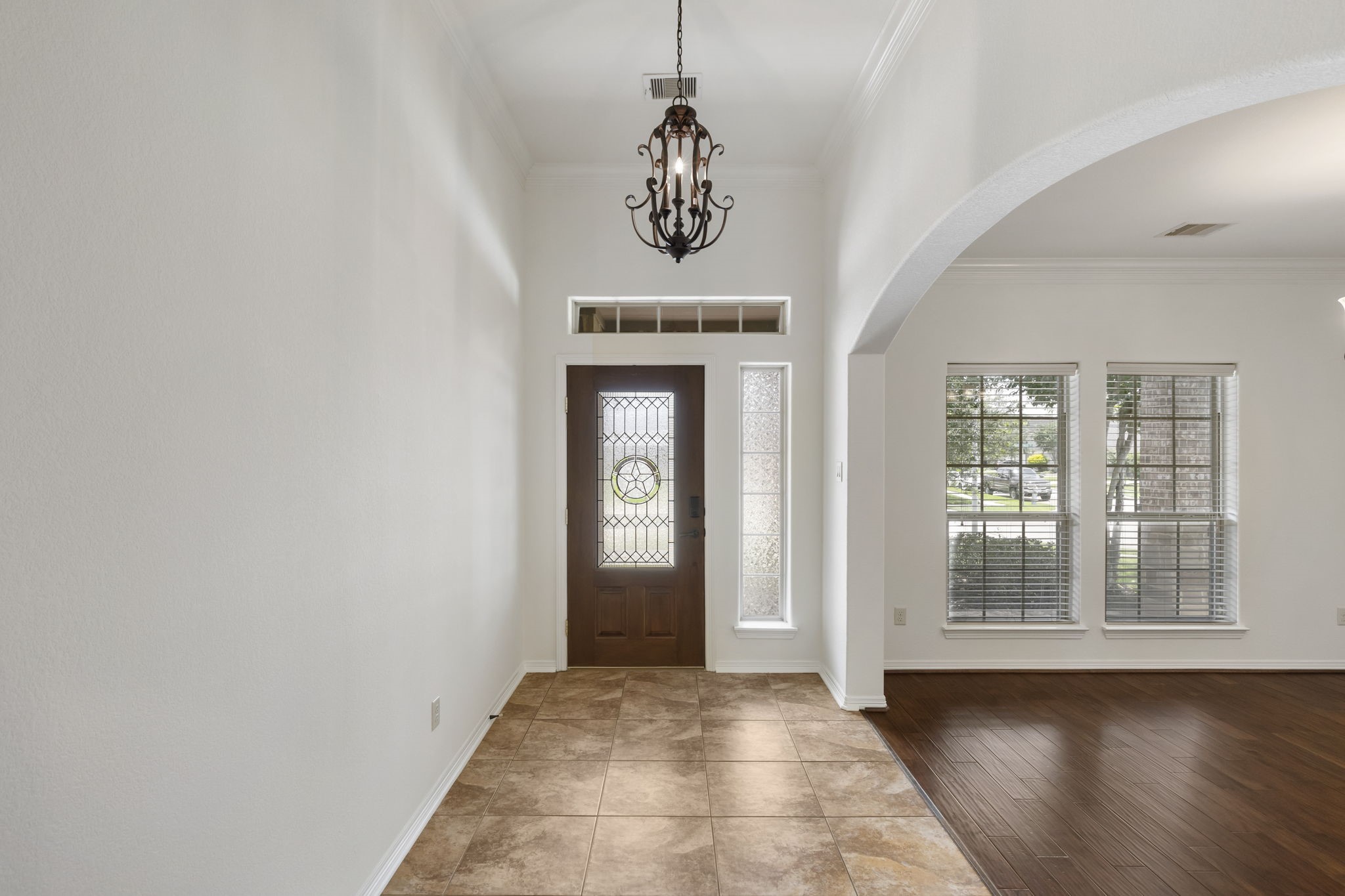 23911 Augusta Falls Lane Spring, TX 77389 - Photo 4 of 40 a view of an entryway with wooden floor