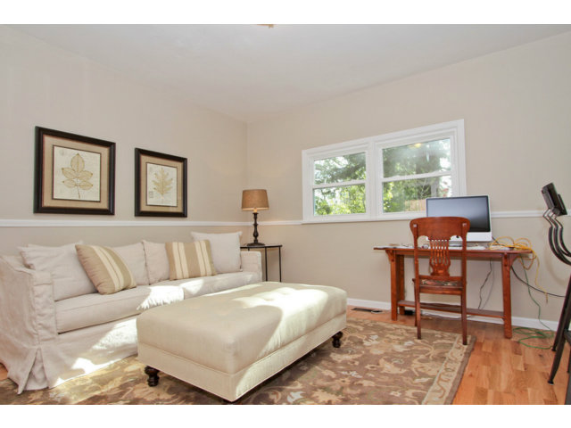 590 Summit Spring Road Woodside, CA 94062 - Photo 8 of 18 a living room with furniture and a table