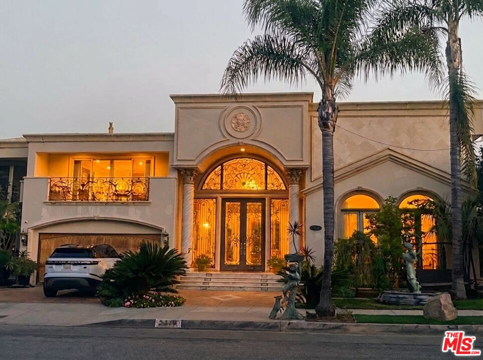 2716 Casiano Road Los Angeles, CA 90077 - Photo 1 of 21 a view of a entryway door front of house with a garden