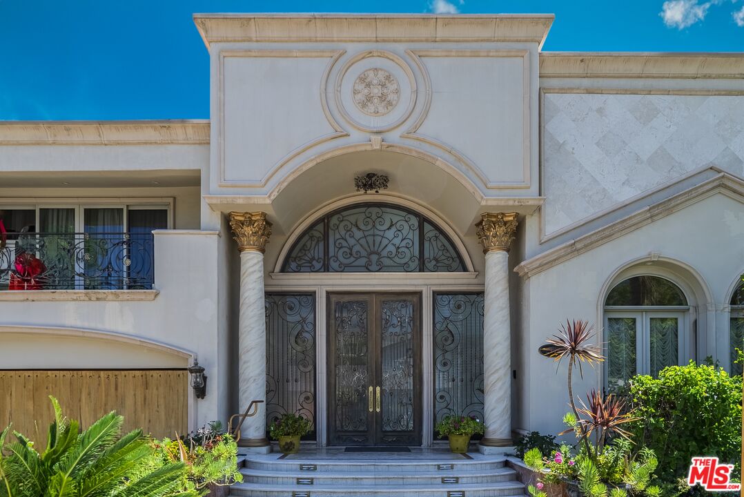 2716 Casiano Road Los Angeles, CA 90077 - Photo 2 of 21 a view of a entryway door of the house