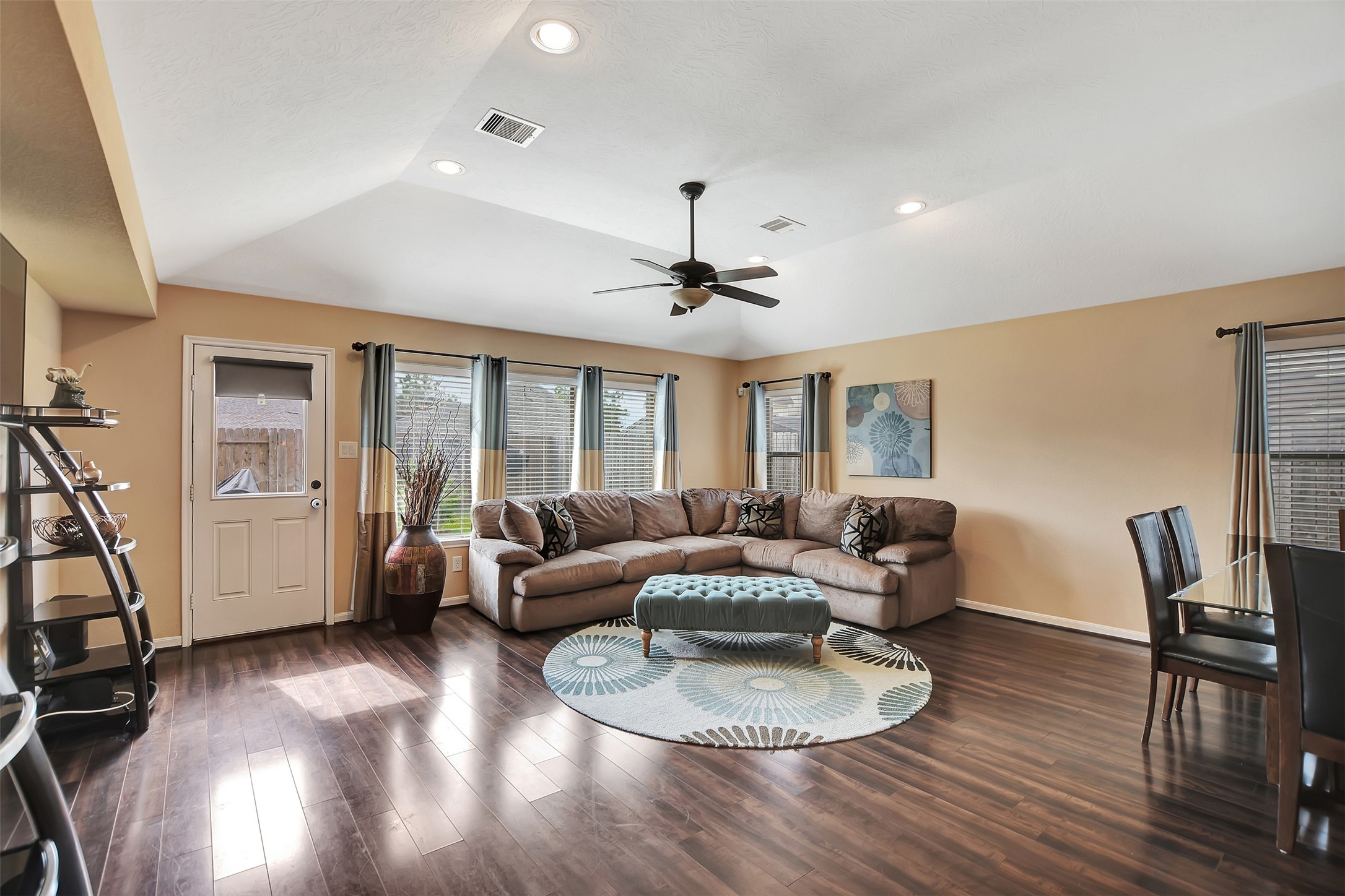 9706 Lockhart Reach Lane Humble, TX 77396 - Photo 9 of 25 a living room with furniture and a wooden floor