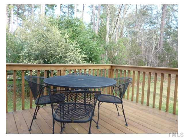5407 Fortunes Ridge Drive Durham, NC 27713 - Photo 18 of 22 a view of a wooden bench on the roof deck