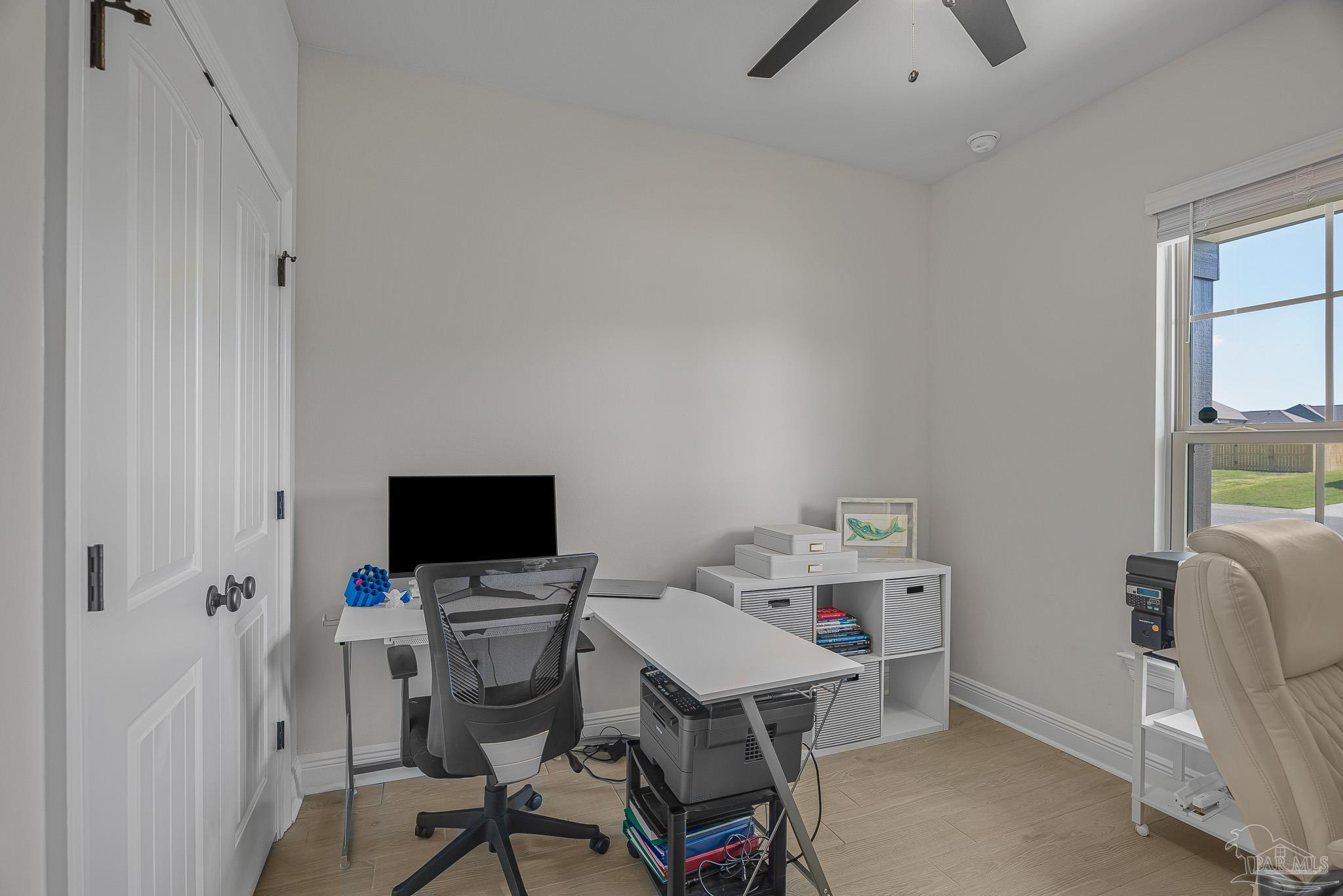5380 Adeline Circle Pace, FL 32571 - Photo 25 of 35 a view of a workspace with furniture