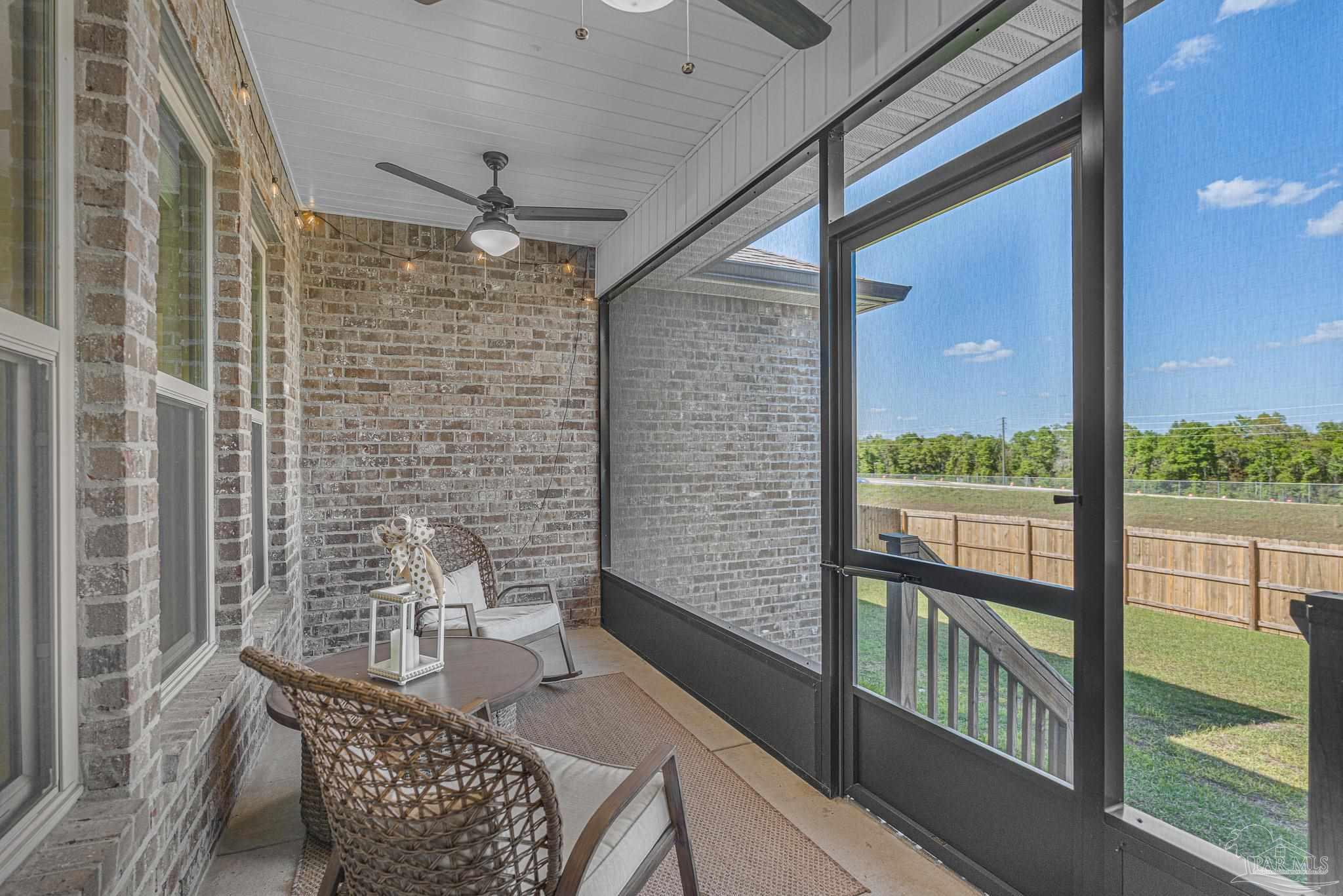 5380 Adeline Circle Pace, FL 32571 - Photo 28 of 35 a bathroom with a granite countertop window and a shower