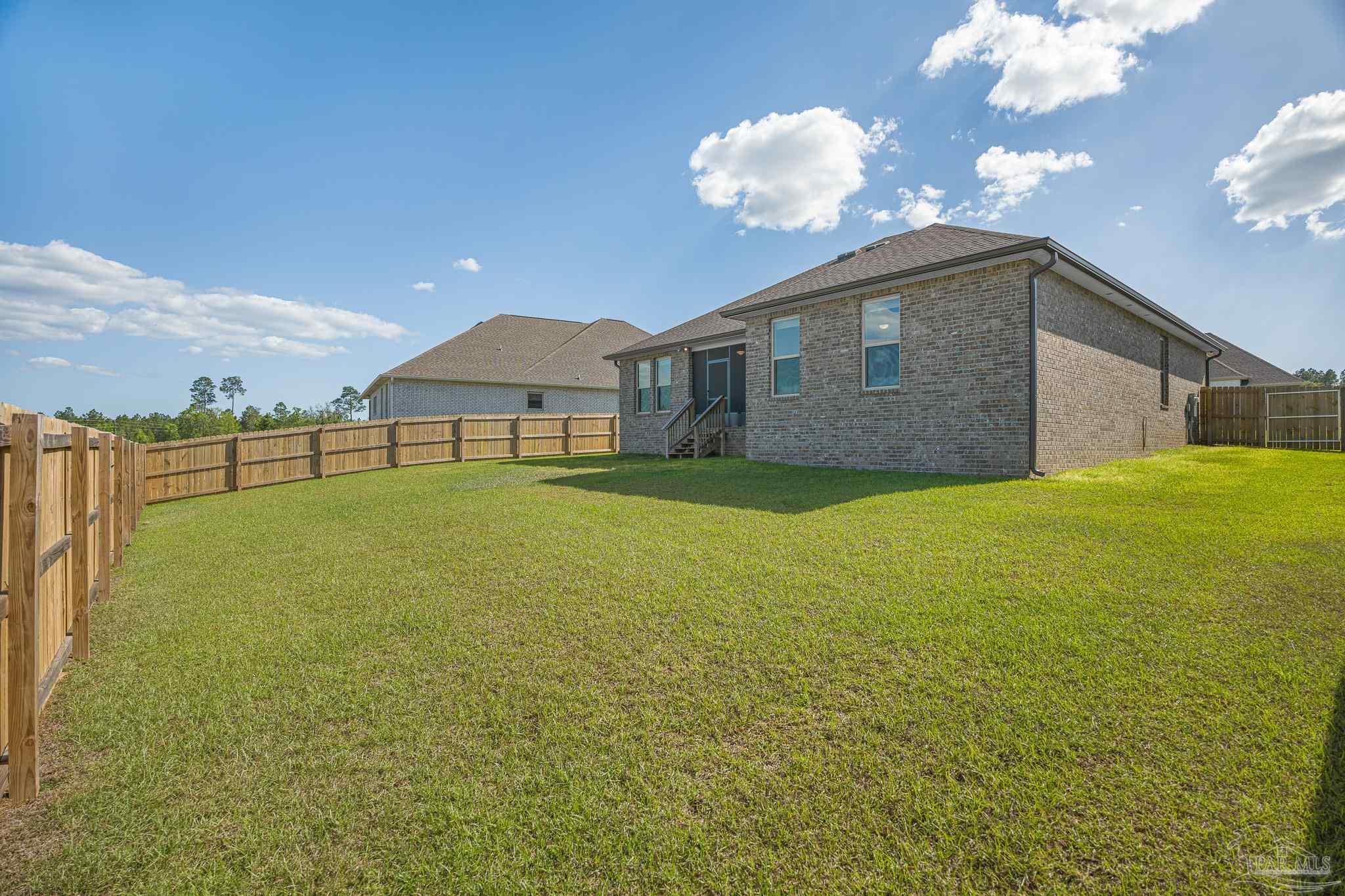 5380 Adeline Circle Pace, FL 32571 - Photo 31 of 35 a house view with a outdoor space