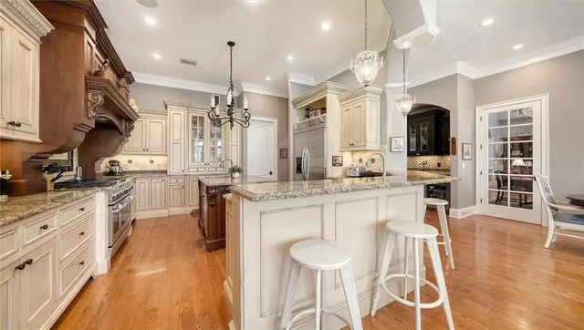 a spacious bathroom with a shower sink and mirror