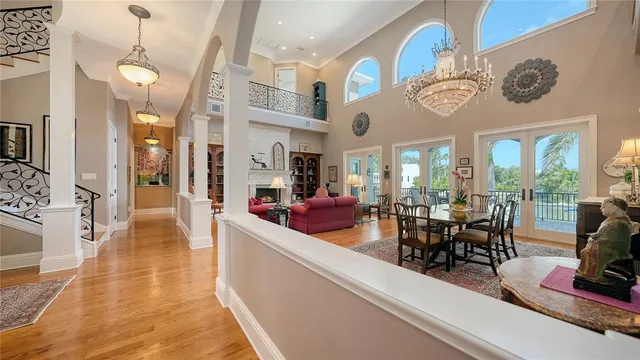 a bedroom with a bed and dresser with mirror