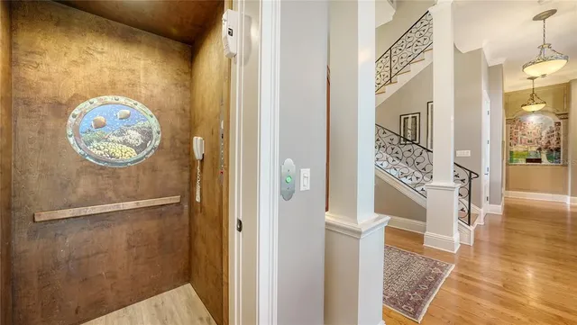 a bathroom with a granite countertop sink a toilet and shower