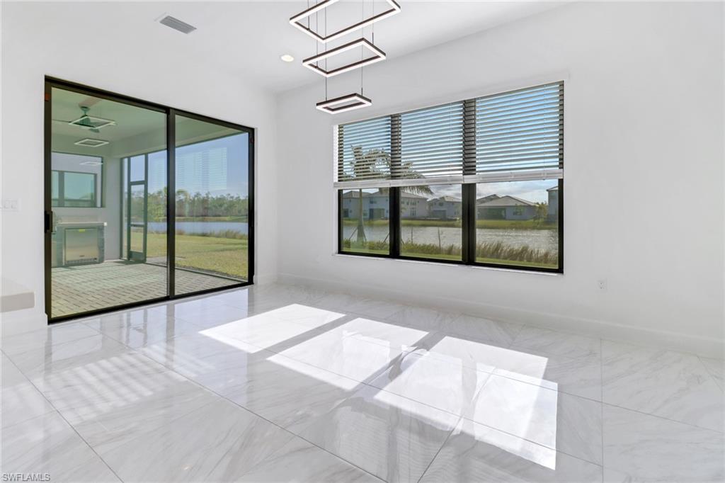 20458 Fair Oak Lane Estero, FL 33928 - Photo 11 of 40 Unfurnished room featuring a water view