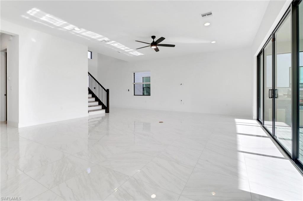 20458 Fair Oak Lane Estero, FL 33928 - Photo 5 of 40 Unfurnished room with ceiling fan