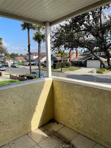 a view of swimming pool with outdoor seating and city view