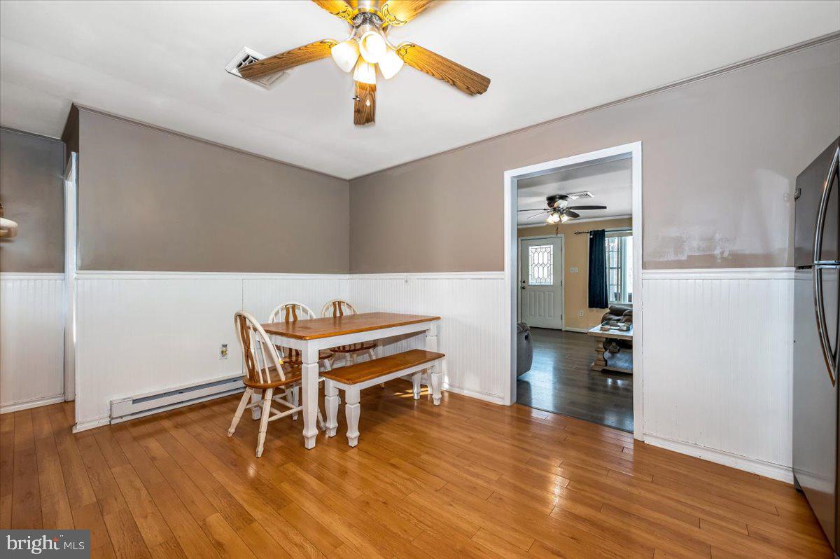 15225 Clear Spring Road Williamsport, MD 21795 - Photo 14 of 44 a living room with furniture and a wooden floor