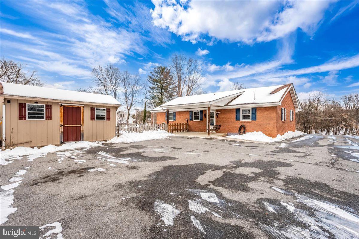 15225 Clear Spring Road Williamsport, MD 21795 - Photo 2 of 44 a view of a yard in front of a house