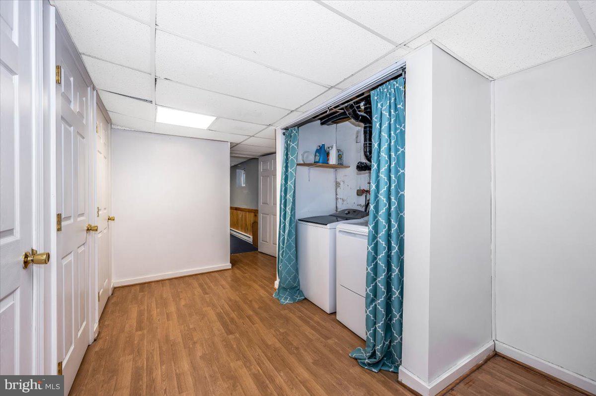 15225 Clear Spring Road Williamsport, MD 21795 - Photo 34 of 44 a view of hallway with wooden floor and staircase