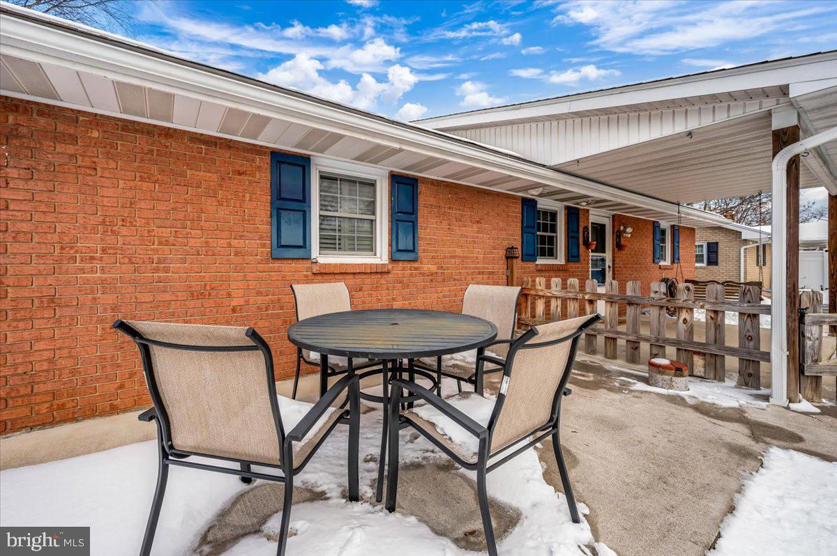15225 Clear Spring Road Williamsport, MD 21795 - Photo 39 of 44 a backyard of a house with table and chairs
