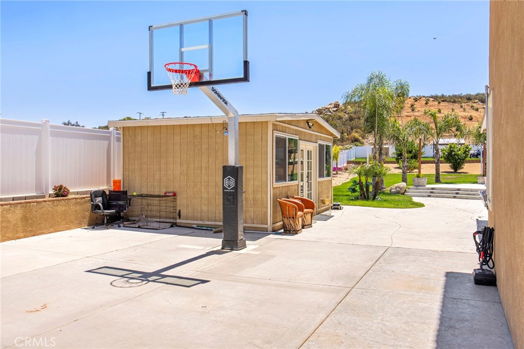 32797 Hayden Road Menifee, CA 92584 - Photo 35 of 51 a view of a terrace with a flat screen tv