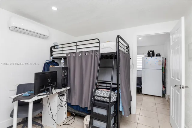 a view of a workspace with furniture