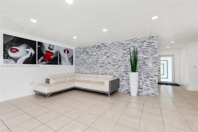 a living room with furniture and a couch