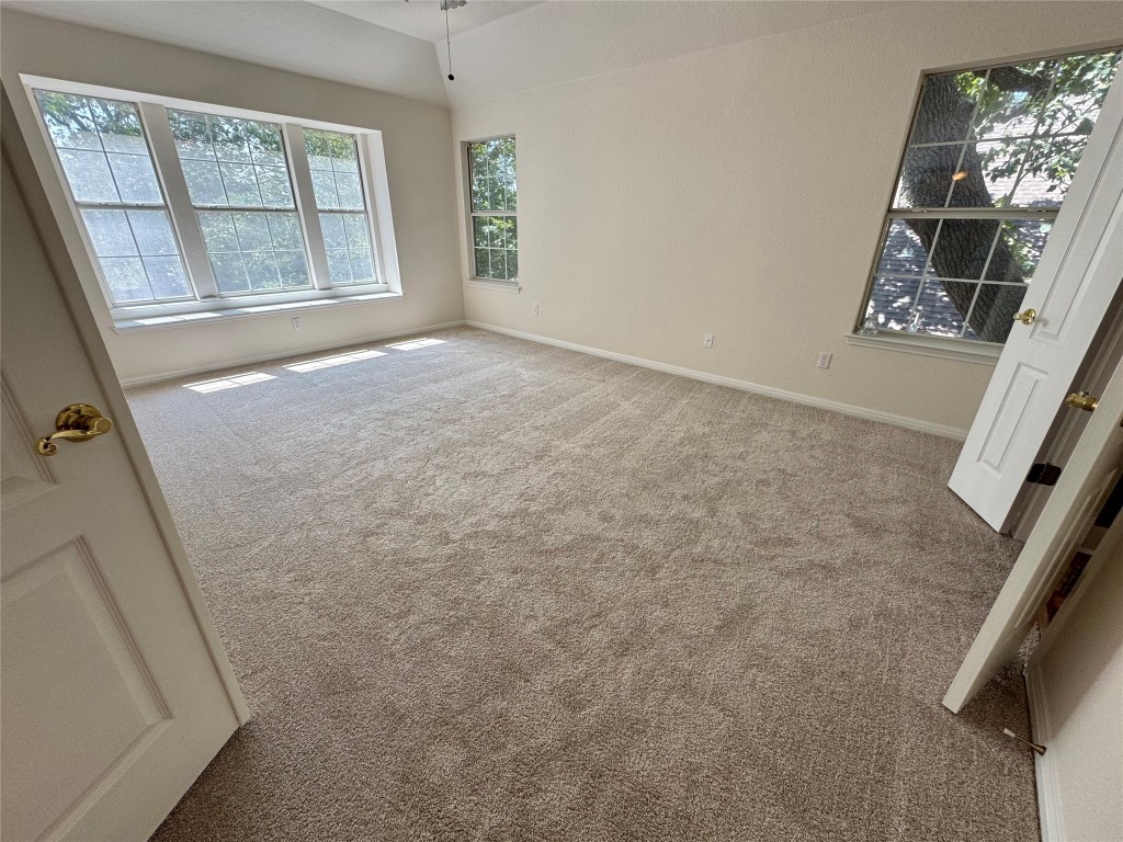 6319 Zadock Woods Drive Austin, TX 78749 - Photo 18 of 39 an empty room with windows