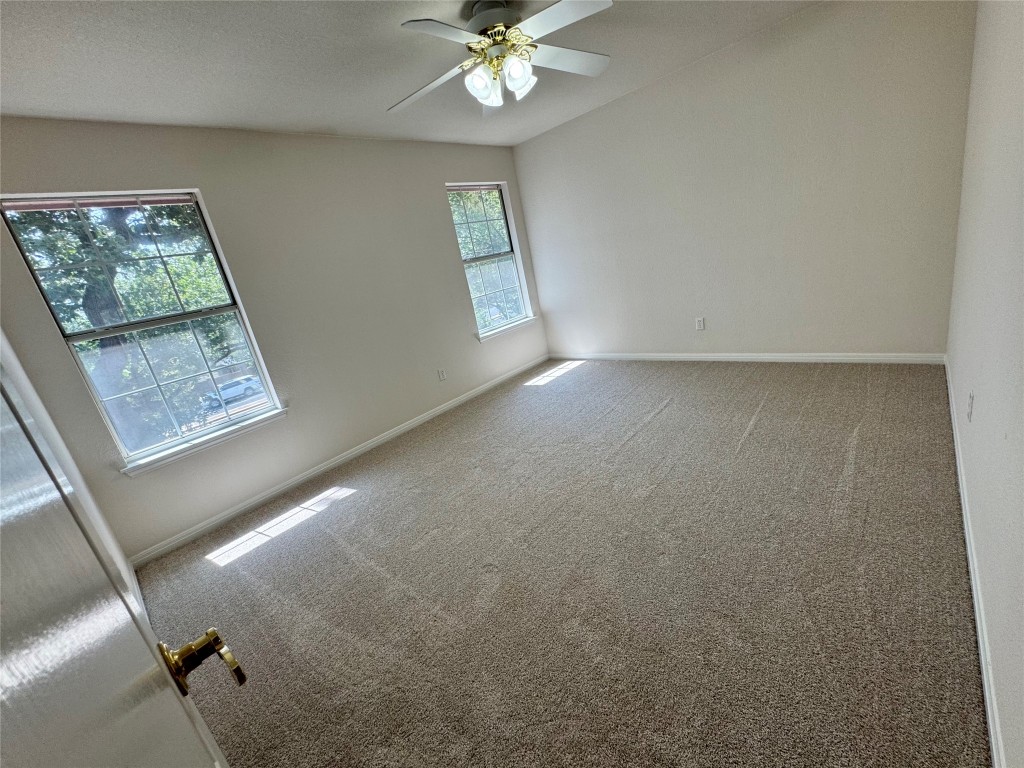 6319 Zadock Woods Drive Austin, TX 78749 - Photo 22 of 39 a view of an empty room with a window