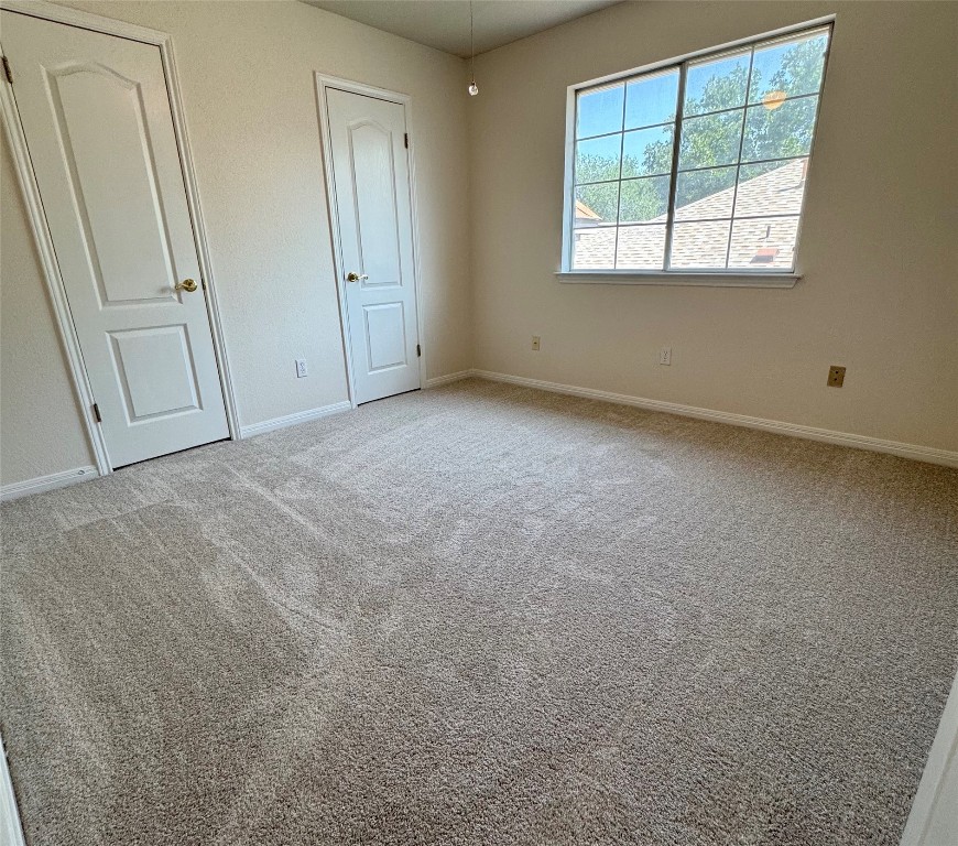 6319 Zadock Woods Drive Austin, TX 78749 - Photo 26 of 39 an empty room with windows
