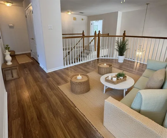 a view of a dining table and chairs in the patio
