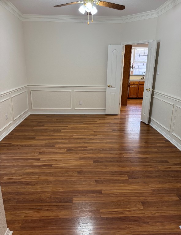6319 Zadock Woods Drive Austin, TX 78749 - Photo 3 of 39 a view of an empty room with wooden floor and a ceiling fan