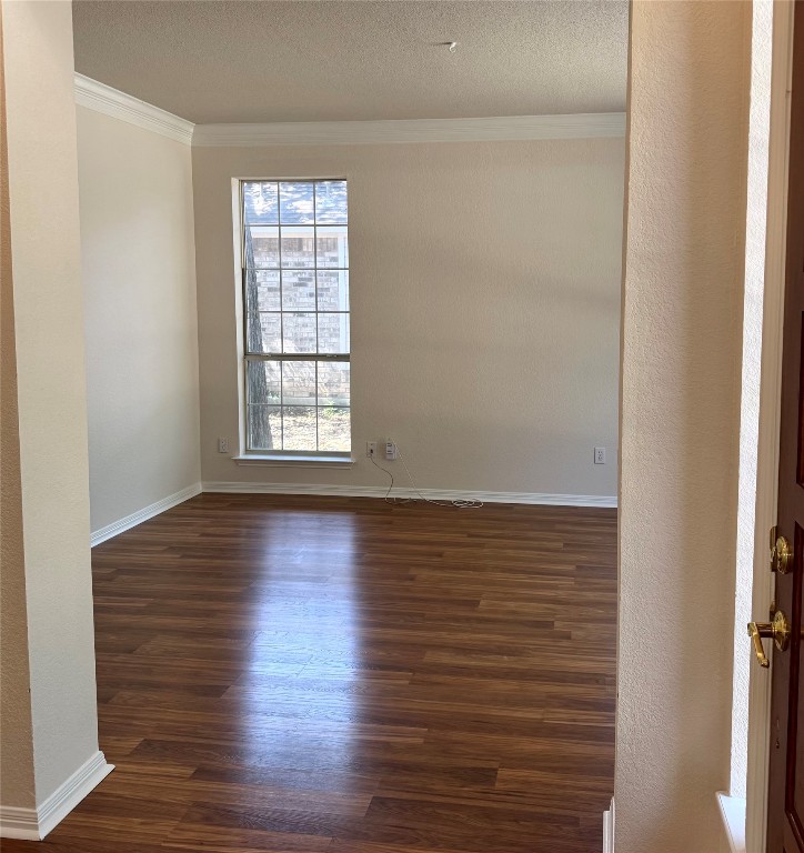 6319 Zadock Woods Drive Austin, TX 78749 - Photo 5 of 39 wooden floor in an empty room with a window