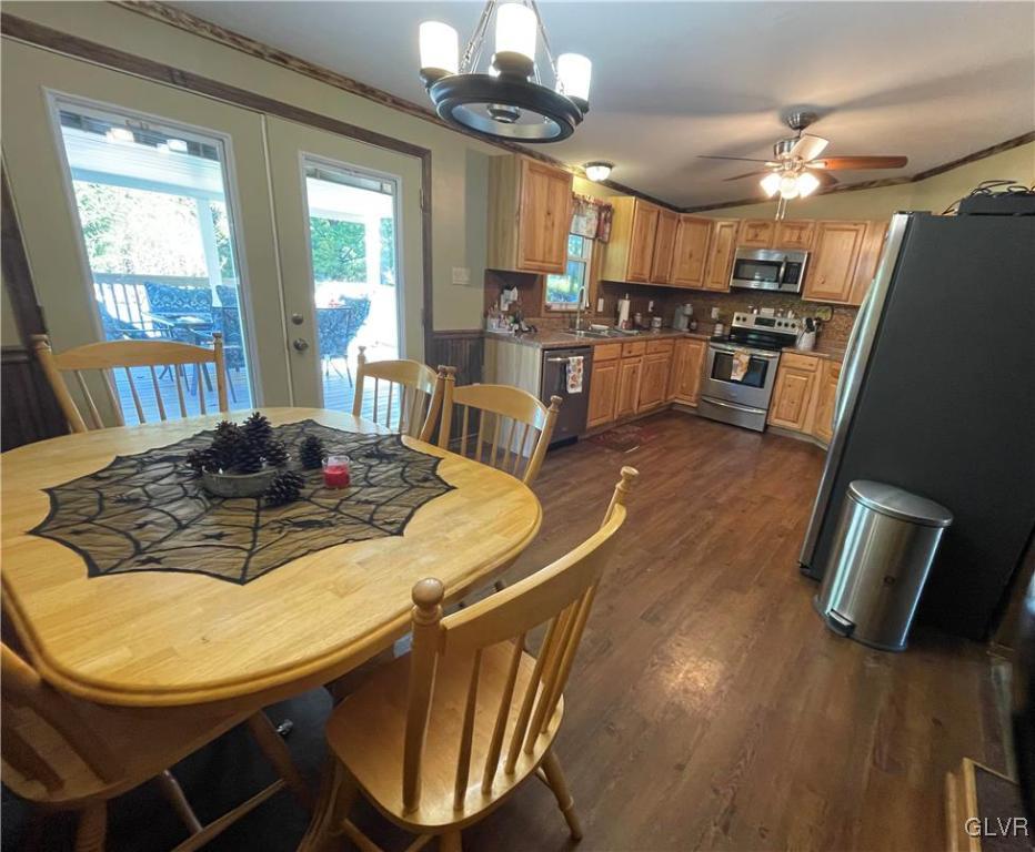 147 Tilly Lane Effort, PA 18330 - Photo 17 of 48 a view of a dining room with furniture window and wooden floor