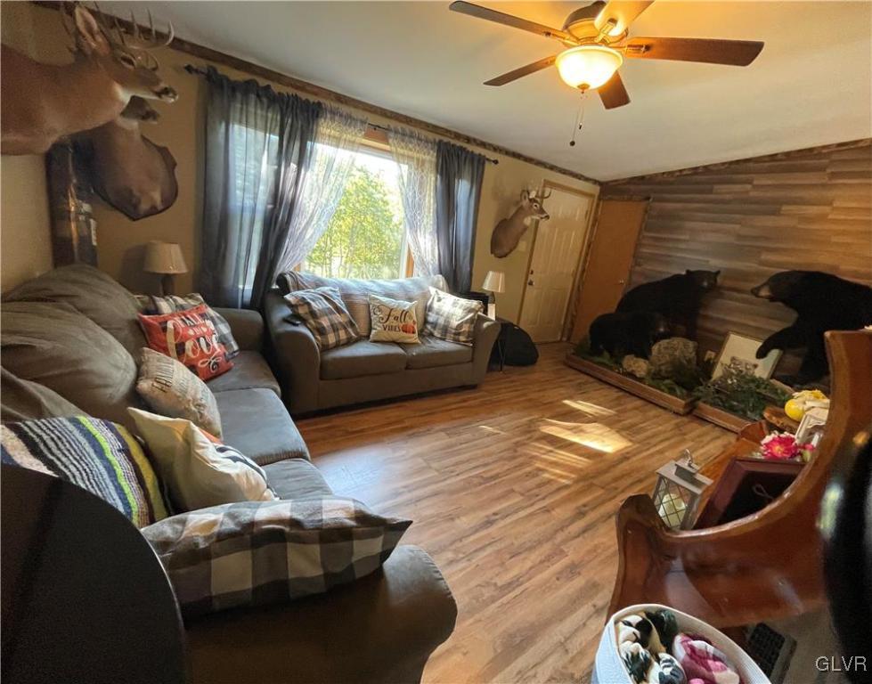 147 Tilly Lane Effort, PA 18330 - Photo 24 of 48 a living room with furniture and a large window